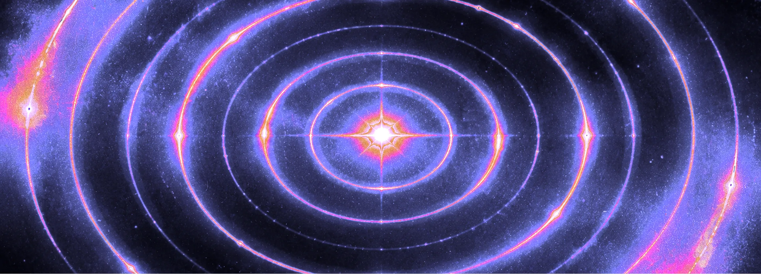 Concentric luminous rings surrounding a bright central star